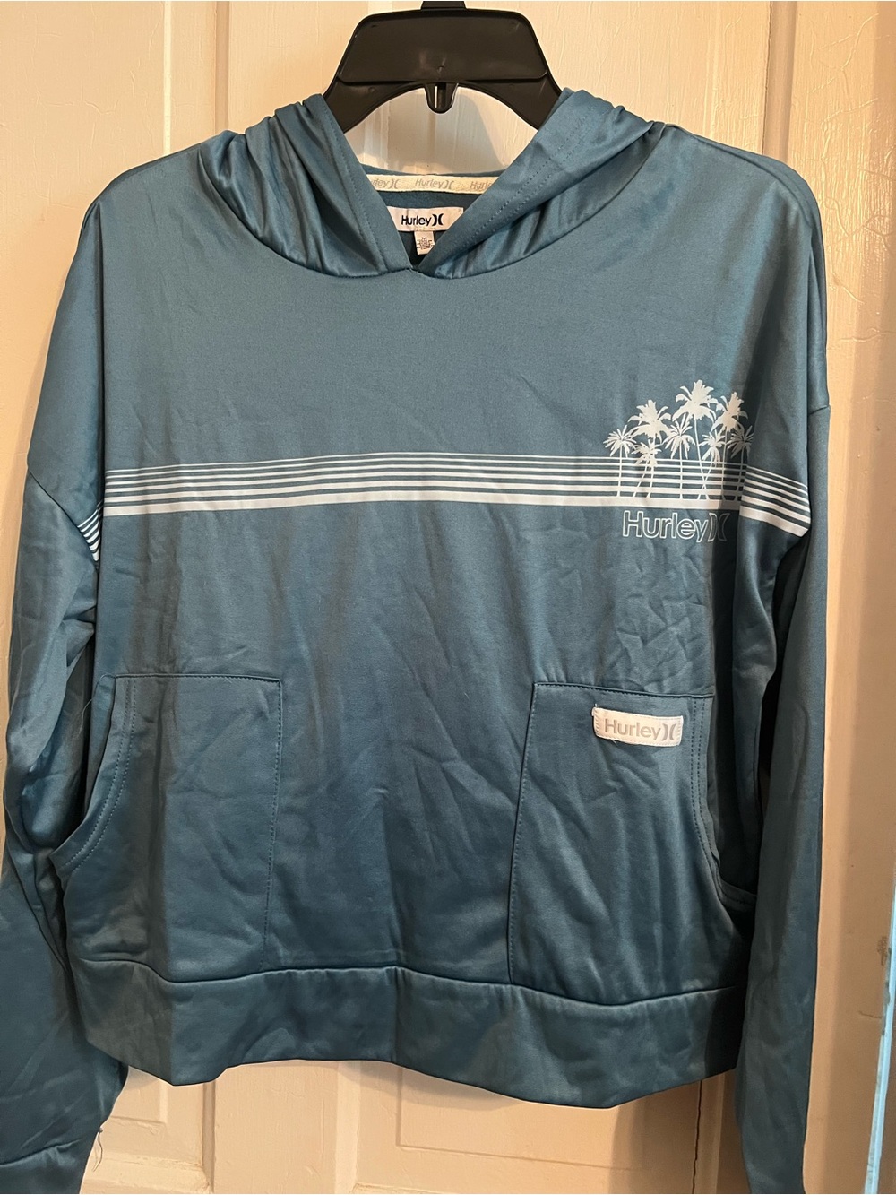 Hurley woman’s Teal Blue Hooded Pullover with Palm Stripe Graphic super soft!